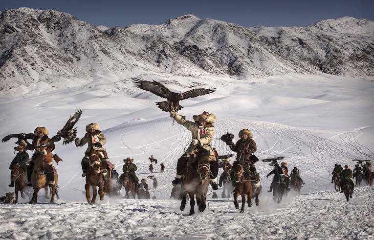 on January 30, 2015 in Xinjiang, China.  The Eagle Hunting festival, organised by the local hunting community, is part of an effort to promote and grow traditional hunting practices for new generations in the mountainous region of western China that borders Kazakhstan, Russia and Mongolia. The training and handling of the large birds of prey follows a strict set of ancient rules that Kazakh eagle hunters are preserving for future generations.