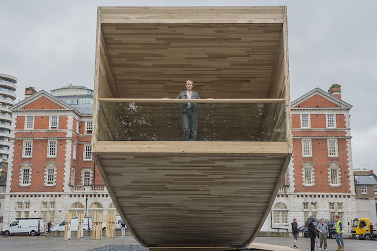 The Smile, a landmark project for the London Design Festival designed by architect Alison Brooks (pictured) and the engineer was ARUP. It will be on show outside the Chelsea College of art from 17 September – 12 October. Measuring 34m in length, the curved form is a ‘bold and exciting’ experiment in wood engineering and in design being made from cross-laminated timber (CLT) in tulipwood, it has been initiated by The American Hardwood Export Council (AHEC).