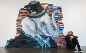 Whimsical Painting of an Elephant on Books